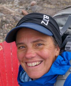 A photo of a woman wearing a baseball cap